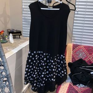 Black asymmetrical cocktail dress with white polka dots